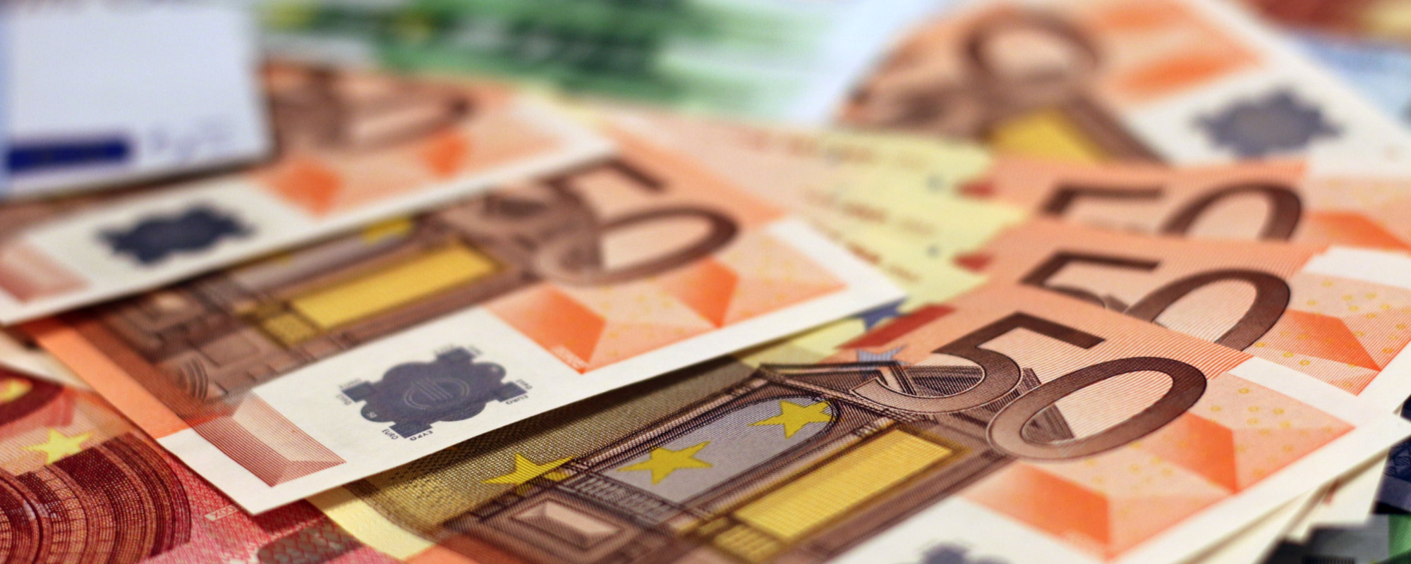 Piles of euro bills.