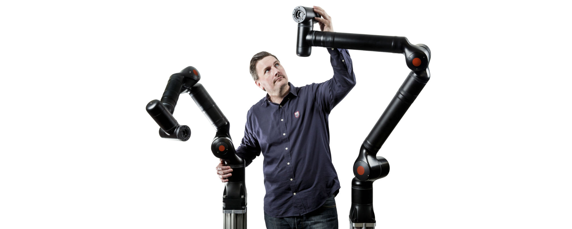 Banner. Kristain Kassow and two of his cobots